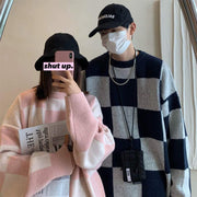 Loose and idle autumn and winter thickening cotton knitwear in pink and navy blue, suitable for teenagers, with a loose fit and cotton blend fabric.