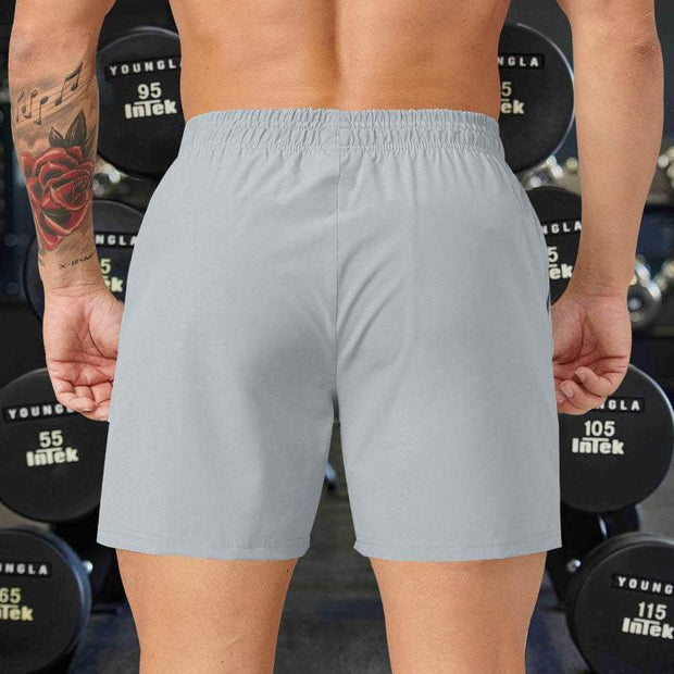 Light gray men's performance training shorts, polyester, elastic waistband.