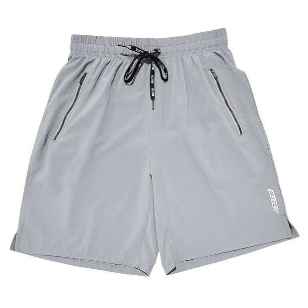 Light gray BUTZ performance training shorts with zip pockets, elastic waistband, and polyester fabric.